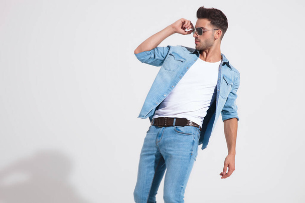 Side view of a attractive casual man dancing - Photo, Image