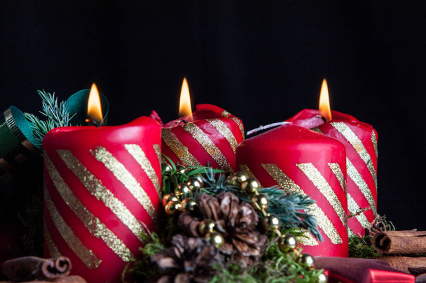 Advent candles on a black background - Zdjęcie, obraz