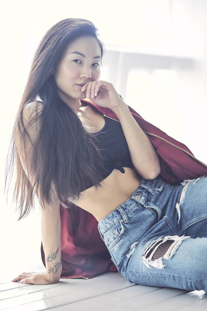 Excited Asian young girl, full length portrait isolated. - Valokuva, kuva