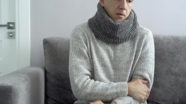 Young man sick and freezing at home. - Filmagem, Vídeo