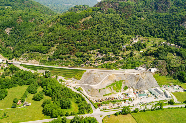 Valtellina (It) - Construction of the new S.S. 38 in the Paniga area in Morbegno - Aerial view - Фото, зображення