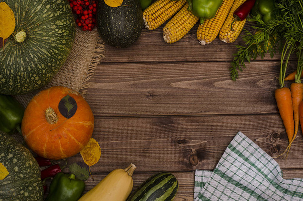Thanksgiving autumn still life of vegetables with copy space on a dark wooden background. Harvest festival. - Fotografie, Obrázek
