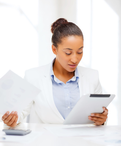 Businesswoman with tablet pc in office - Foto, Imagem