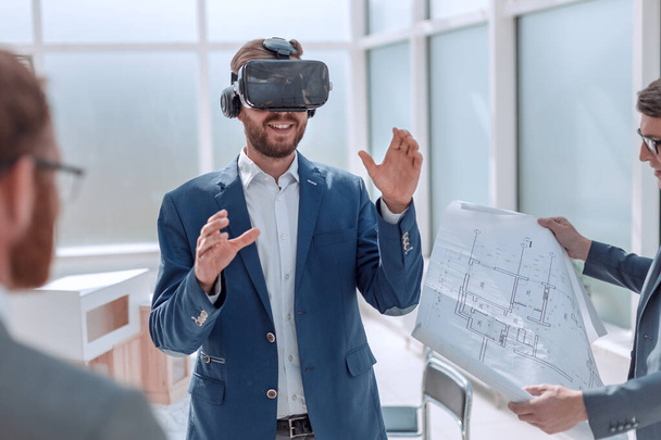 architect using virtual reality glasses in the workplace. - Photo, Image