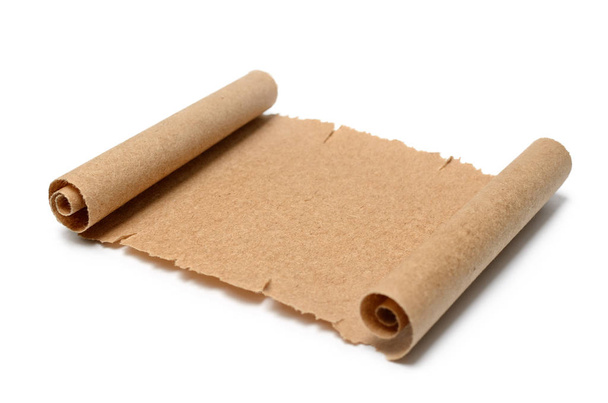 Ancient scroll of paper on a white background. - Foto, afbeelding