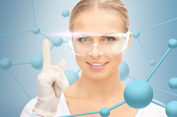 Woman in protective glasses and gloves - Foto, imagen