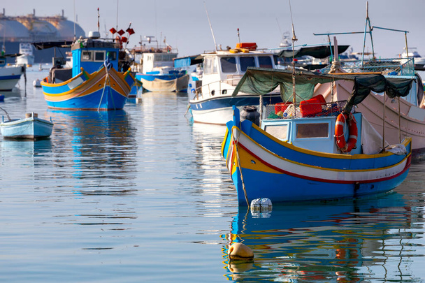 Marsaxlokk. Traditional boats Luzzu in the old harbor. - Photo, Image