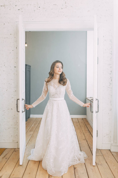 Beautiful girl in white dress, European wedding. Air and light photo shoot of the bride.  - Φωτογραφία, εικόνα