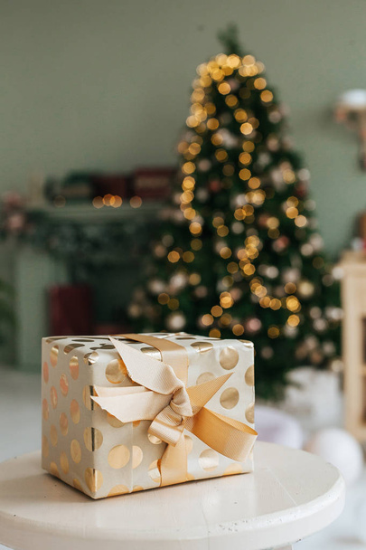 Christmas present under the Christmas tree - Foto, Imagen