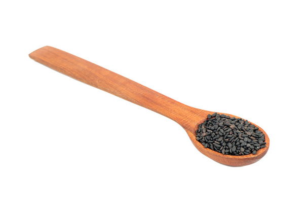 Black sesame in spoon - Photo, Image
