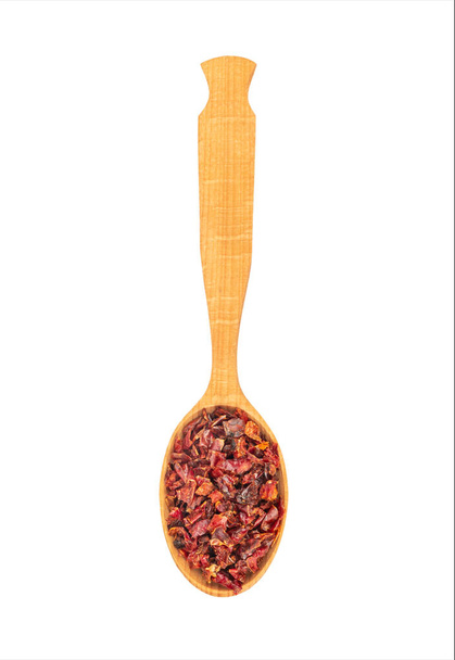 Pimienta roja seca en cuchara
 - Foto, imagen