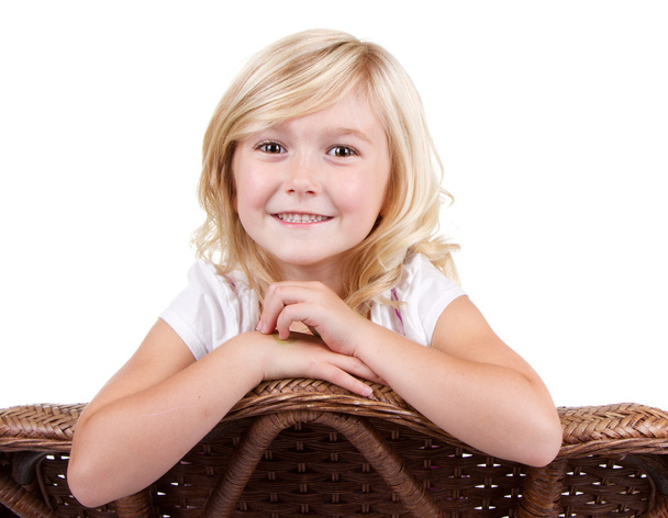little girl sitting on a chair - Фото, зображення
