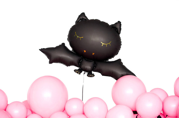 Beautiful Halloween decor in black and pink colors. - 写真・画像