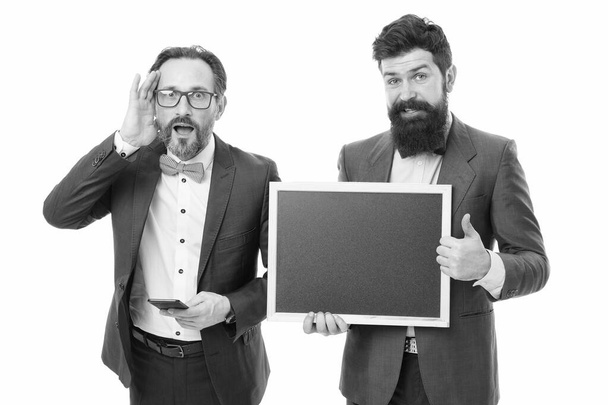 welcome on board. bearded men hold advertisement blackboard. partners celebrate start up business isolated on white. formal businessmen use phone, copy space. announcement. board party invitation - Foto, imagen