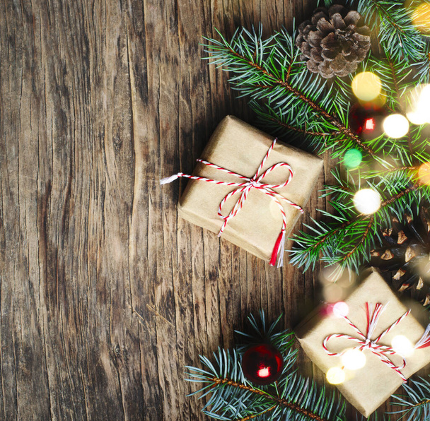 Christmas background. Christmas gift, fir tree and decorations o - Foto, Bild