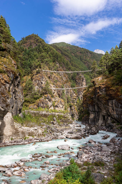 Suspention bridge on the Everest Base Camp Trek, Himalaya mounta - Fotó, kép