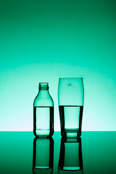 Bottle and beer-glass - Fotoğraf, Görsel