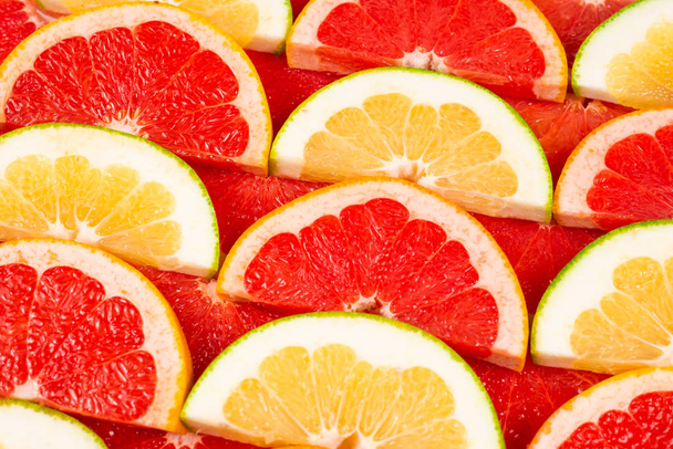 Pomelo és grapefruit szeletek háttér.  - Fotó, kép