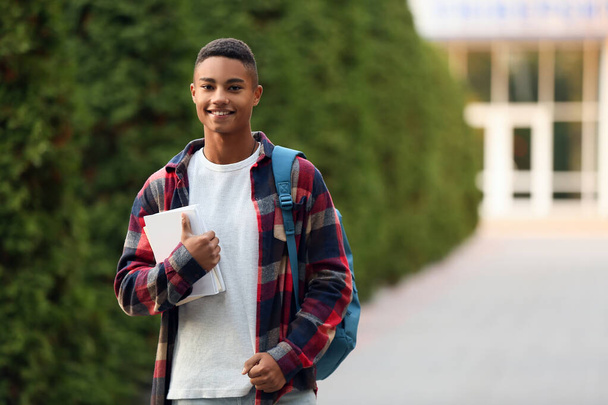 Portrait of teenage African-American student outdoors - Zdjęcie, obraz