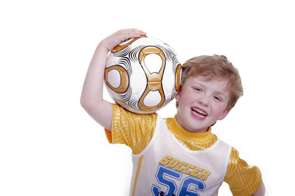 Kind met voetbal - Foto, afbeelding