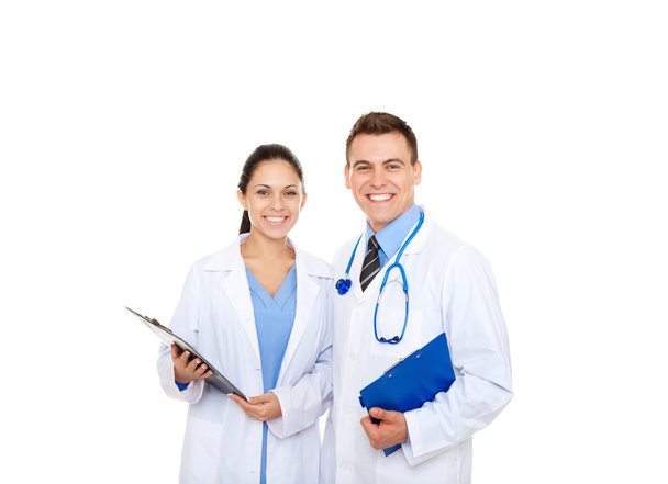 Man and woman with stethoscope holding folders - Фото, зображення