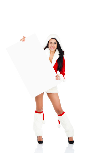 Party woman in Clause costume holding blank board - Foto, imagen