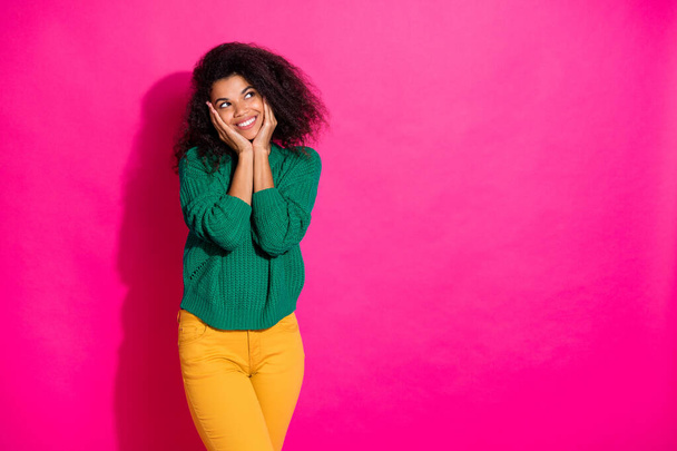 Portrait of her she nice attractive lovely delighted cheerful cheery wavy-haired girl in green sweater touching face enjoying isolated over bright vivid shine vibrant pink fuchsia color background - Fotografie, Obrázek