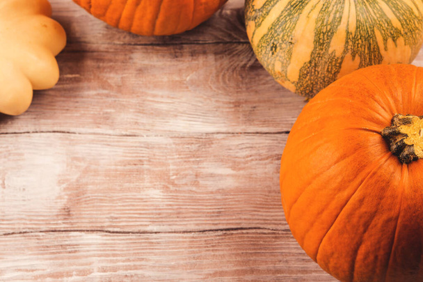 Autumn moody rustic background with pumpkins - Fotó, kép