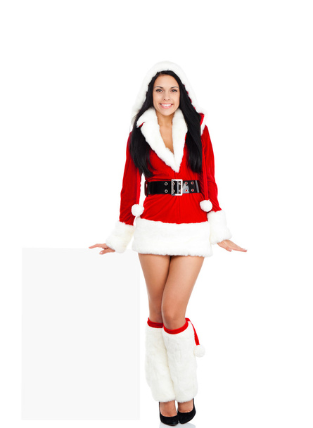 Party woman wearing Clause costume - Foto, Imagen