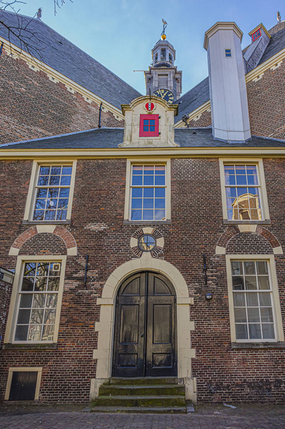 View of Northern church (Noorderkerk) - XVII century Protestant church in Amsterdam. Noorderkerk is located along Prinsengracht canal, on the Noordermarkt square. Amsterdam, Netherlands. - Fotografie, Obrázek