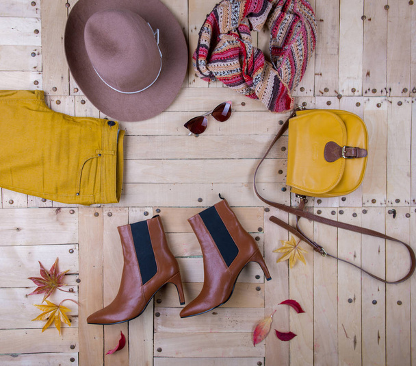 women's autumn clothes, Women's autumn outfit on wooden background - Фото, зображення