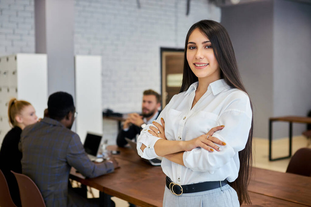 Confident business lady posing in office, look at camera - Photo, Image