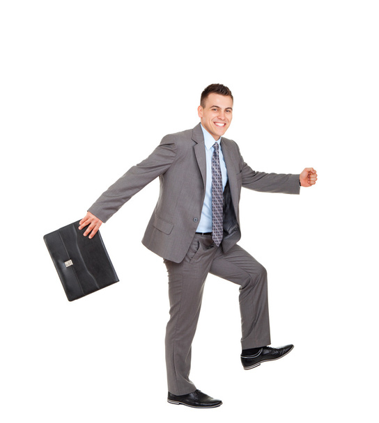 Handsome businessman run with briefcase - Fotó, kép