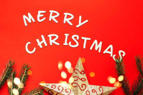 words of Merry christmas on red background. - Foto, afbeelding