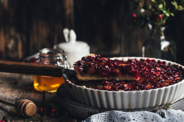 pie with cranberries and apples, selective focus - Foto, Imagem