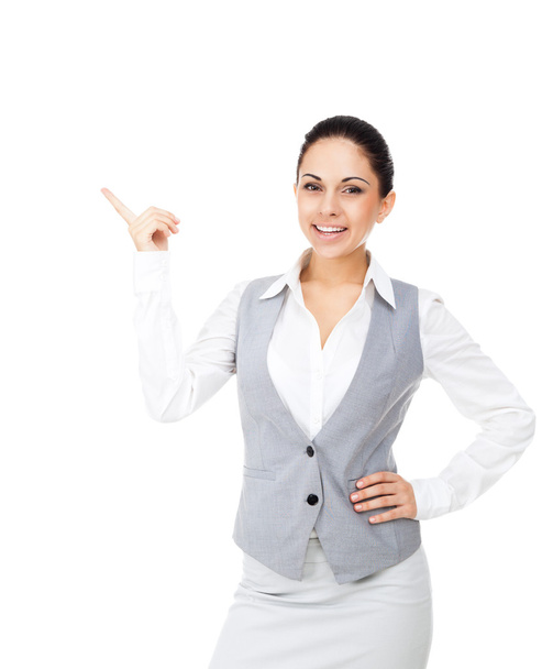 Businesswoman pointing to copy space - Photo, Image