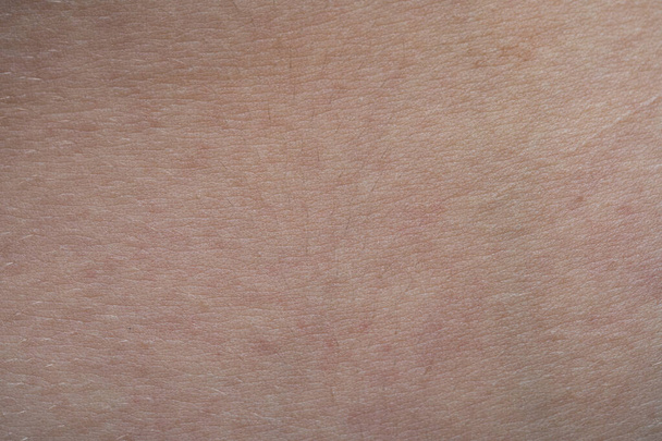 Macro shot of the young pink human's skin texture - Photo, Image