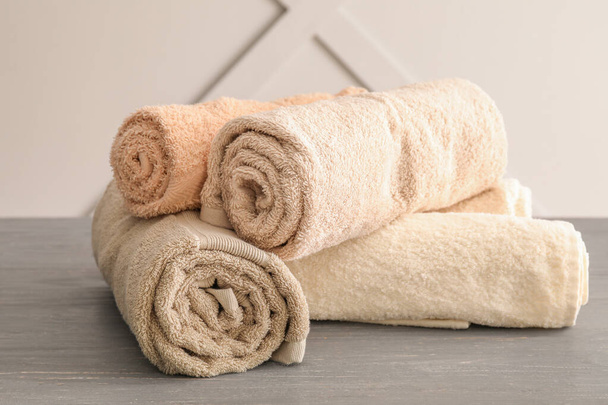 Soft clean towels on table - Фото, зображення