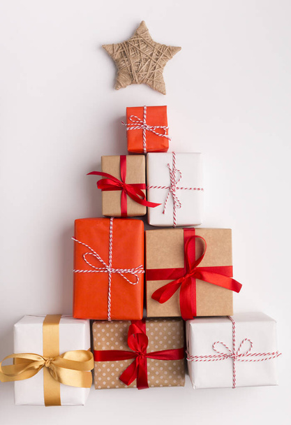 Alternative Christmas tree made of colored present boxes - Fotó, kép