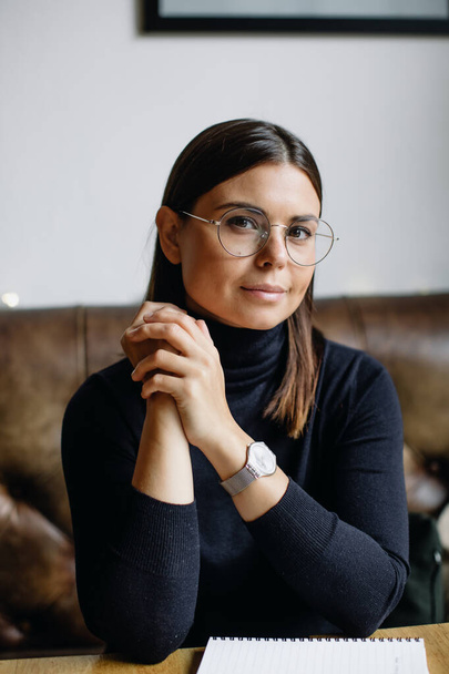 Portrait of a young woman in glasses. Young business woman - Фото, зображення
