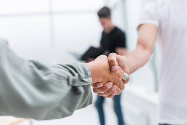 close up. background image of a business handshake - Foto, afbeelding