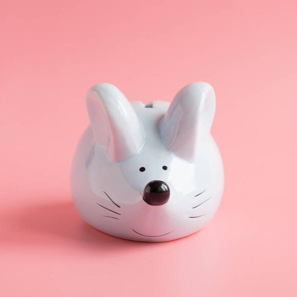 Chinese Zodiac Sign Year of Rat. Little rat as money box on pink. Symbol of 2020 with space for text. Happy New Year 2020 year. - Fotografie, Obrázek