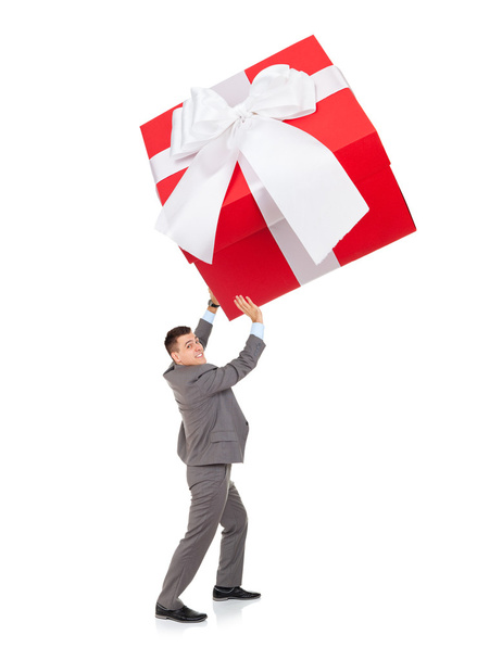 Businessman push big gift box - Фото, изображение