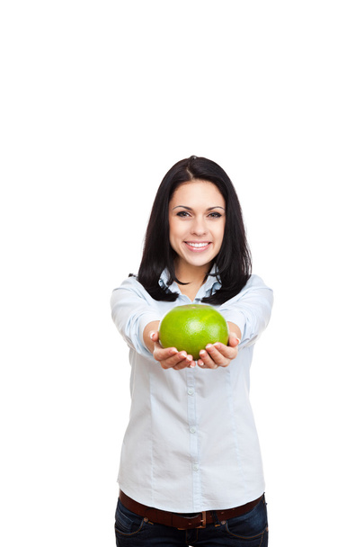 Young woman holding sweety fruit - Фото, изображение