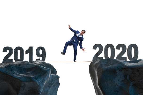 Liikemies tiukalla köydellä vuodesta 2019 vuoteen 2020 - Valokuva, kuva