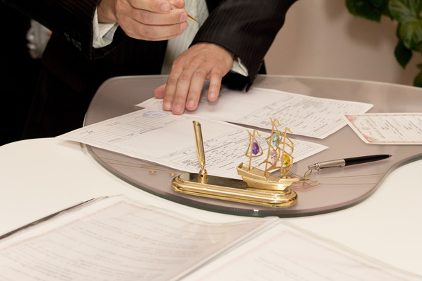 Groom Signing Marriage Certificate - Photo, Image