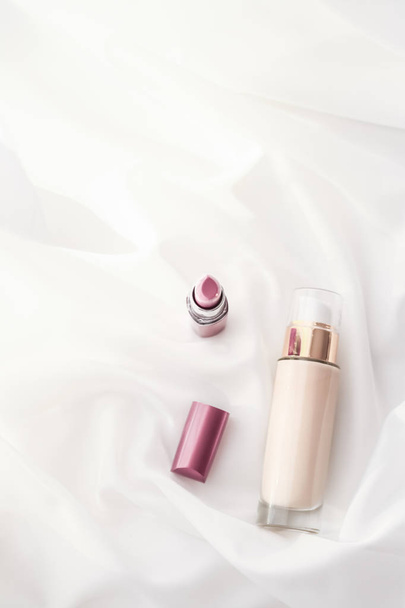 Beige tonal cream bottle make-up fluid foundation base and pink  - Photo, Image