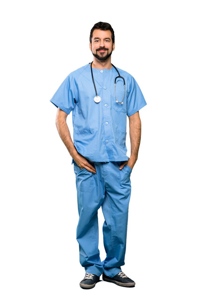Full-length shot of Surgeon doctor man laughing over isolated white background - Foto, Imagen