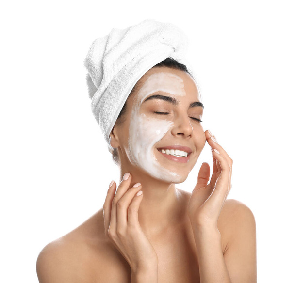 Happy young woman with organic mask on her face against white background - Φωτογραφία, εικόνα