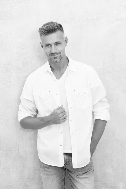 Fashion concept. Man model clothes shop. Mature man model. Feeling comfortable day by day. Menswear and fashionable clothing. Man looks handsome in casual shirt. Guy with bristle wear casual outfit - Fotografie, Obrázek